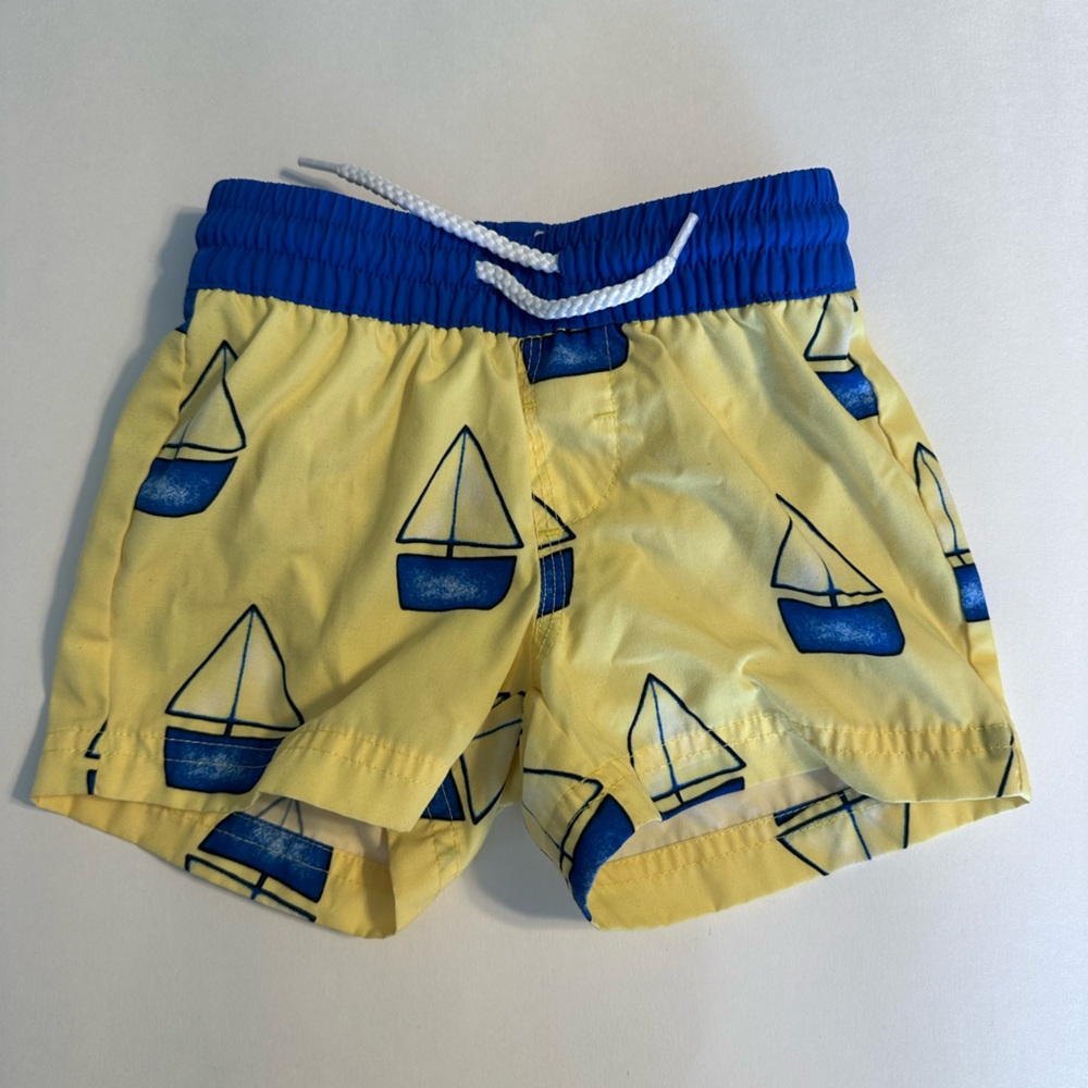 The Beaufort Bonnet Company Yellow & Blue Sailboat Kids Swim Trunks